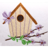 Charming Birdhouse and Blooms